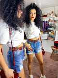 Short in jeans con strappini