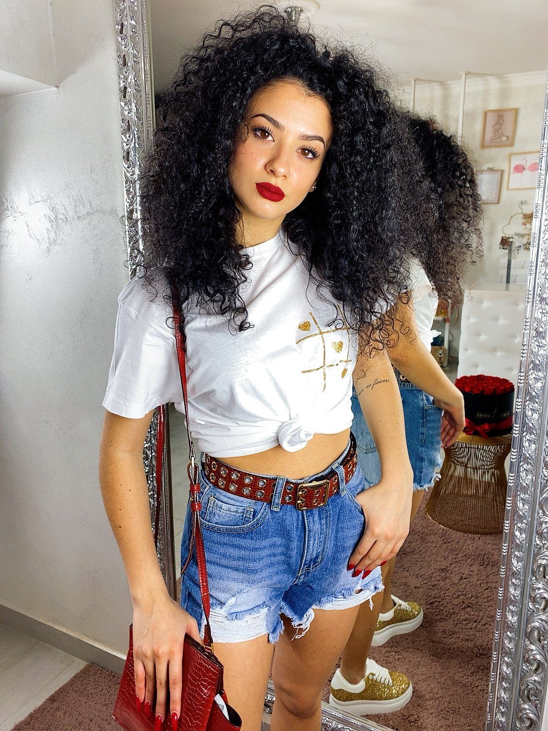 Short in jeans con strappini