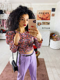 Top con fiorellini rosa manica bombata