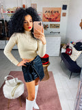 Top crop con zip